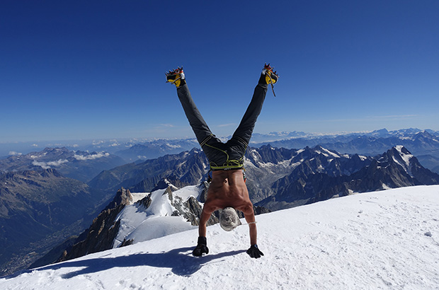 My logotype sign at the Summit of the mountain is the gymnastic handstand.