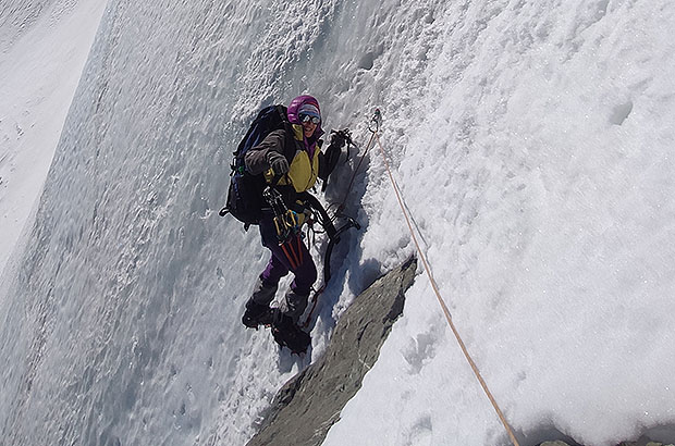 Traversing the steep ice patch right below the Summit of Dykh Tau