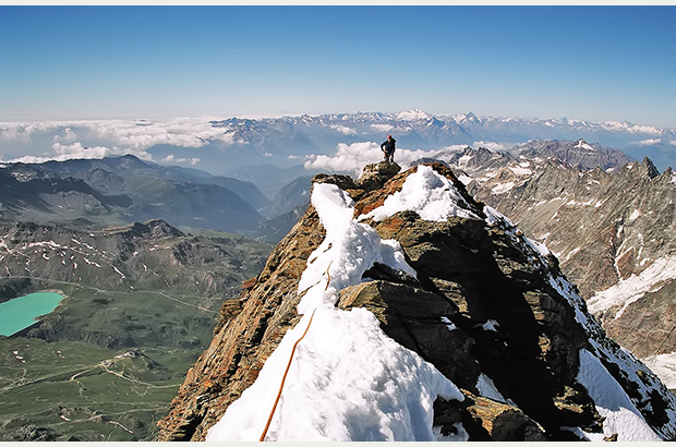 Climbing the rocky ridge of Tyndall Peak - on the way to the summit tower of Mount Matterhorn, Carrel route