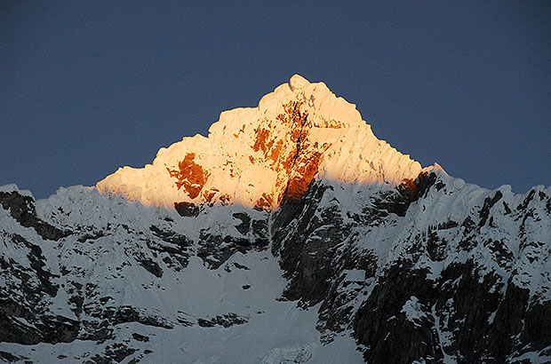 The summit of Nevado Quitaraju at dawn, Cordillera Blanca